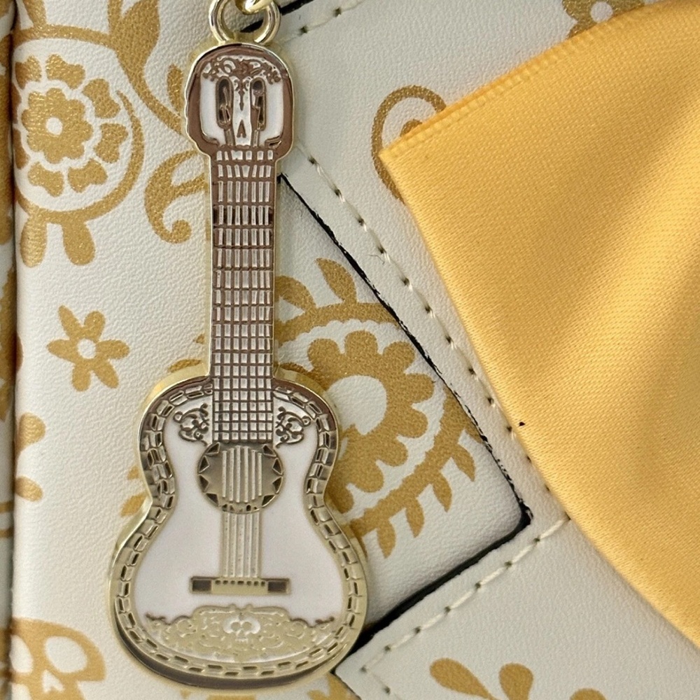 Loungefly Pixar Coco Ernesto De La Cruz Backpack in Gold Yellow and White. NWT - Picture 7 of 13